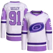 Youth Ronan Seeley Carolina Hurricanes Hockey Fights Cancer Primegreen Jersey - White/Purple Authentic